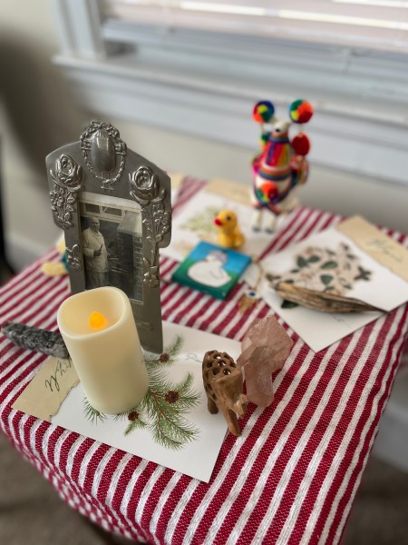 Small Altar on a red and white striped cloth